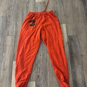 Aviator Nation Orange Sweatpants with Rainbow Patch
